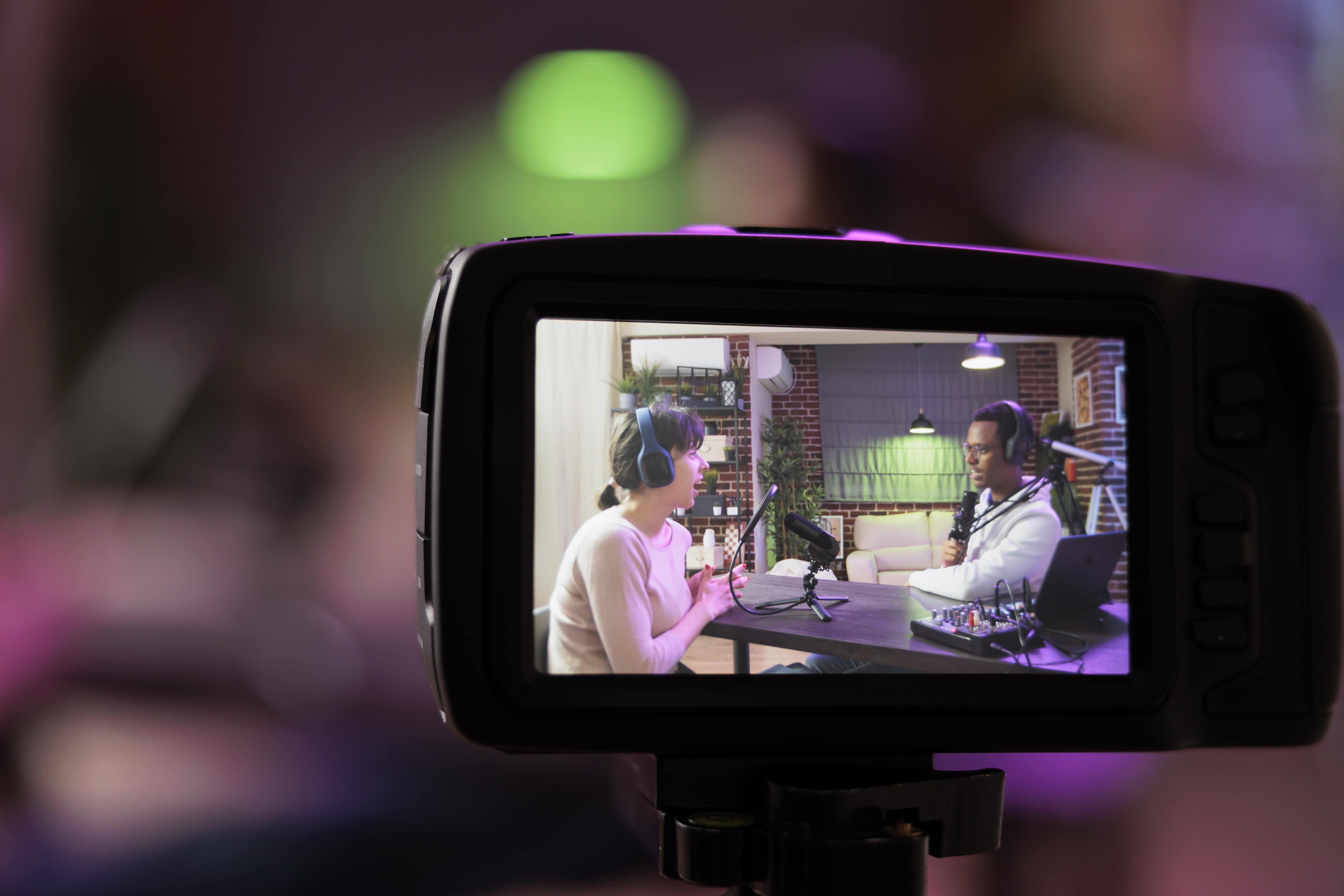 a screen of the camera showing two people talking