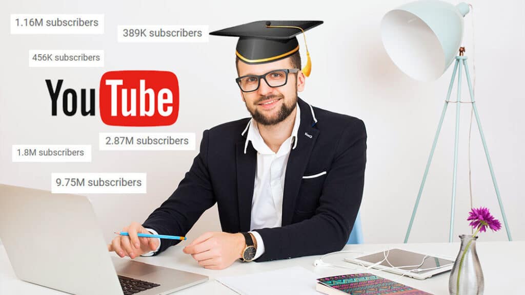 business man at desk with a graduation cap